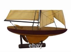 A Carved Wooden Pond Boat With Sails