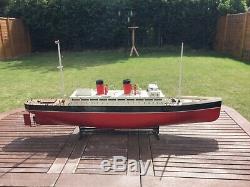 Model boat. Pre war vintage electric powered ship, carved wood hull