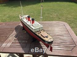 Model boat. Pre war vintage electric powered ship, carved wood hull
