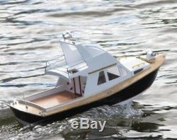 Model boat kit cabin cruiser / sport fishing boat wooden build with free motor