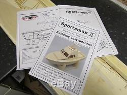 Model boat kit cabin cruiser / sport fishing boat wooden build with free motor