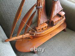 VINTAGE SAILING SHIP BOAT MODEL HANDMADE PINE WOOD ON STAND 19.5 LONG and HANDS