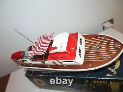 Vintage Lang Craft Model Wood Boat with Flying Scott outboard In original box