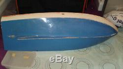 Vintage circa 1960s wooden RC model boat project with new. 15 OS engine