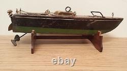 Ancien modèle de bateau à moteur à remontage de clé: Vedette à moteur à remontage de clé, jouet