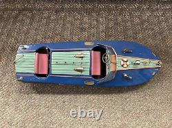 Bateau-modèle en bois vintage rare bleu et rouge fabriqué au Japon, fonctionnant sur batterie.