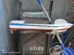 Modèle de jouet de bateau rapide vintage en bois fait main avec de grandes pièces lourdes en métal